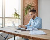Portrait Adult Serious Male Company Director Sitting Comfortable Office Checking Company Profits Laptop Scaled